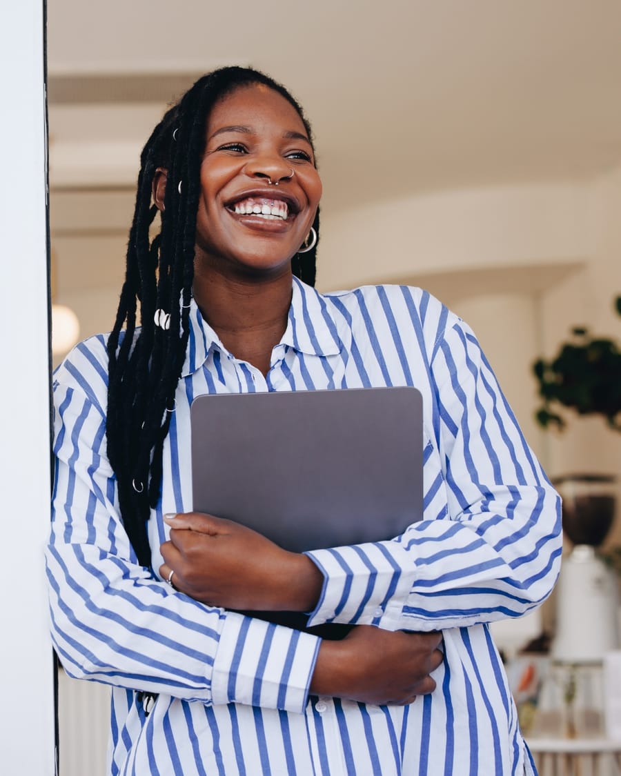 Creative professional working confidently at her desk